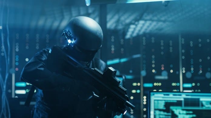 Soldier in a tech-oriented room Soldier in a tech-oriented room