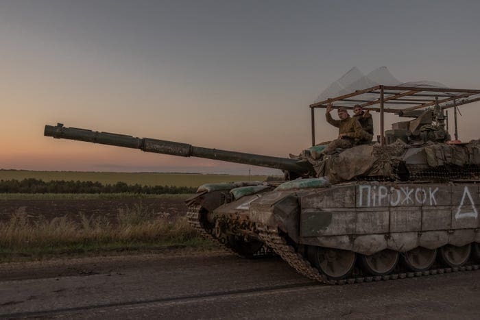 Ukrainian servicemen operate a tank on a road near the border with Russia. The Ukrainian army entered Russia's Kursk region on August 6, capturing dozens of settlements in the biggest offensive by a foreign army on Russian soil since World War II.