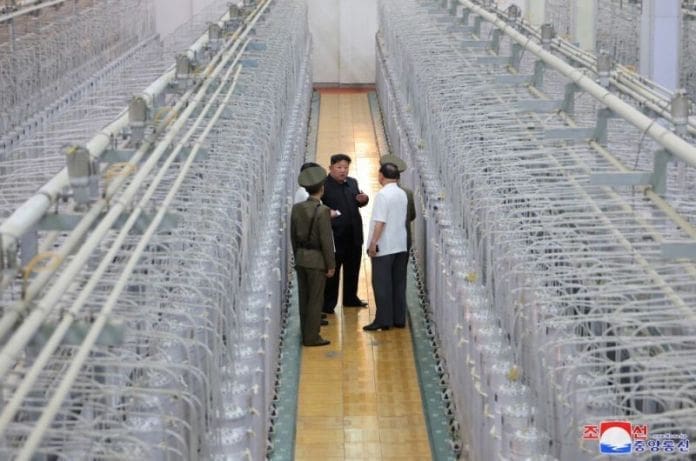 North Korea releases images of Kim Jong Un visiting a uranium enrichment  site | CNN
