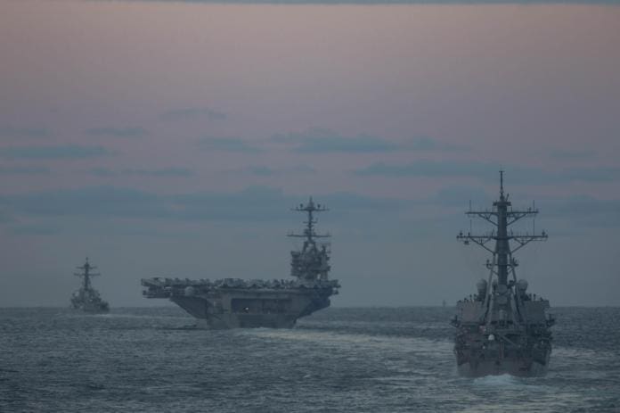 USS Stout (DDG 55), right, USS Harry S. Truman (CVN 75), middle, and USS  Jason Dunham (DDG 109), left, transit the Strait of Dover ahead of USS  Gettysburg (CG 64). Oct 14, 2024 [5036 x 3357] : r/WarshipPorn