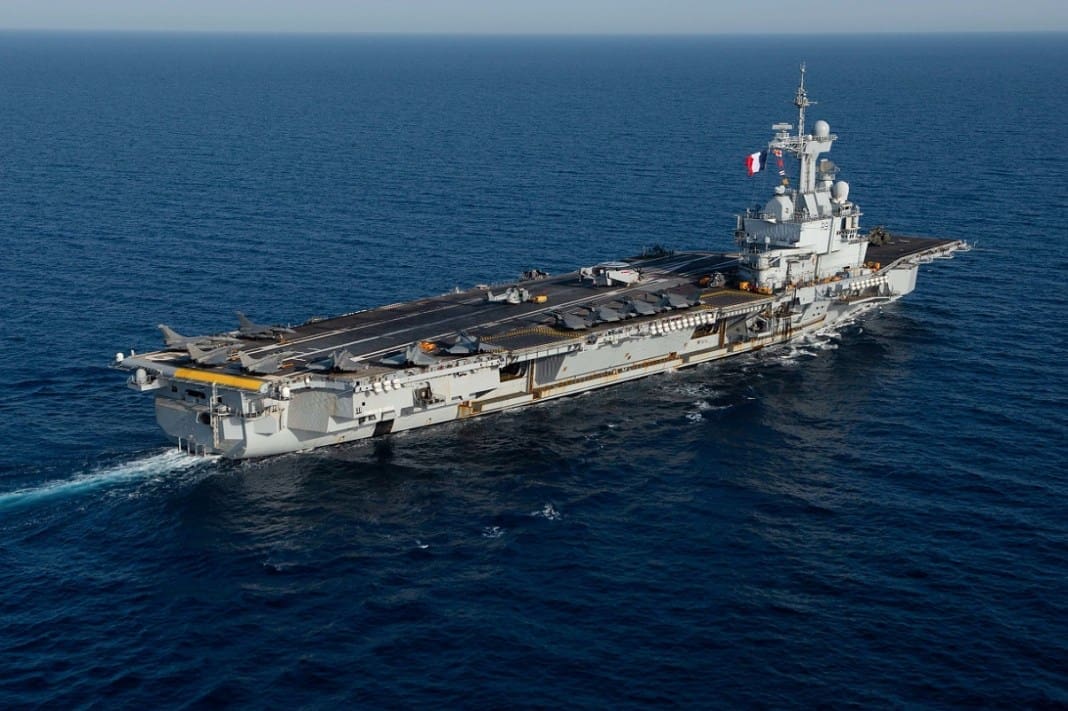 The Charles de Gaulle Carrier Strike Group and the John C. Stennis Carrier Strike Group conduct operations at sea